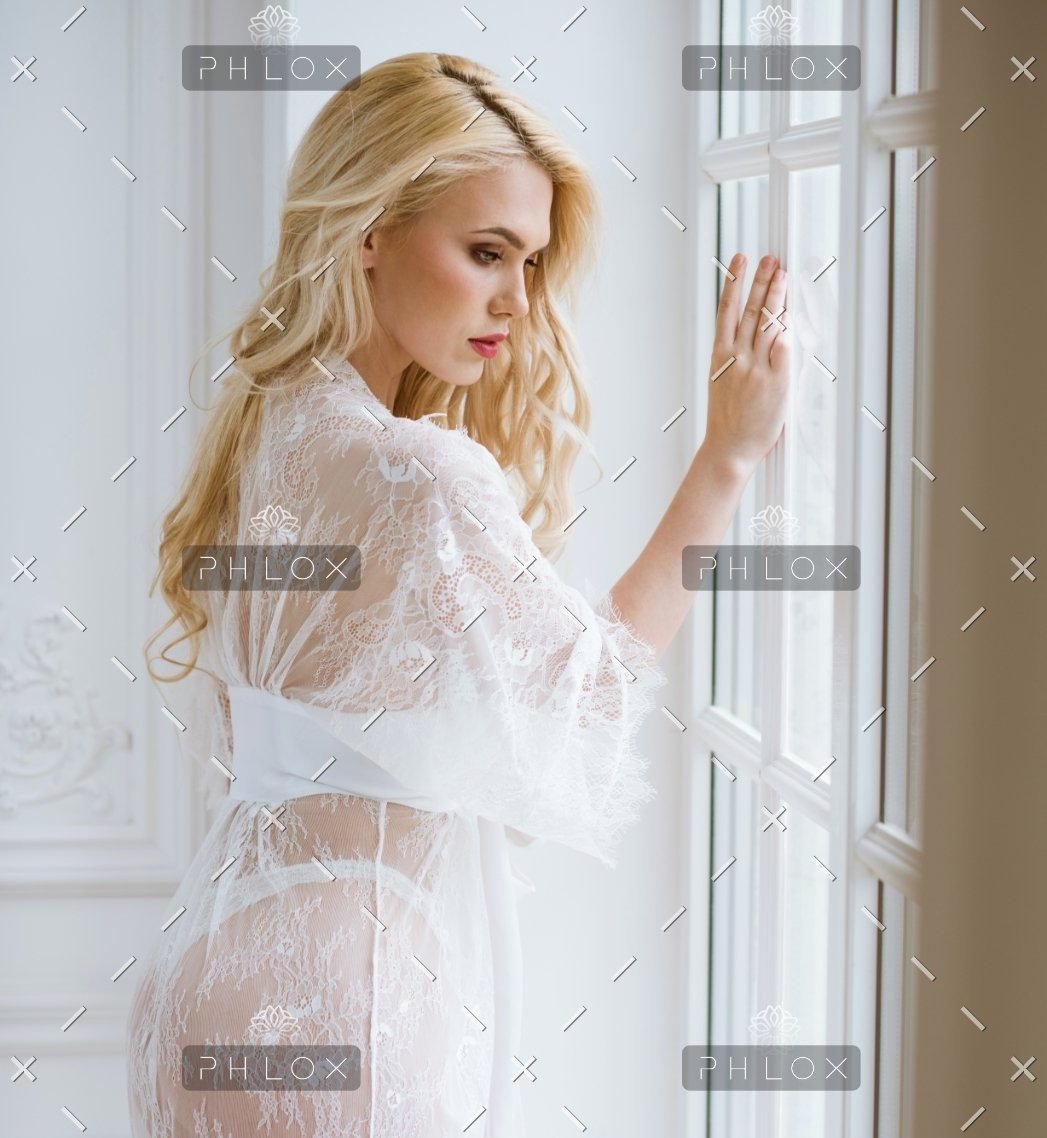 demo-attachment-142-beautiful-lady-in-elegant-white-robe-PSJHR5G