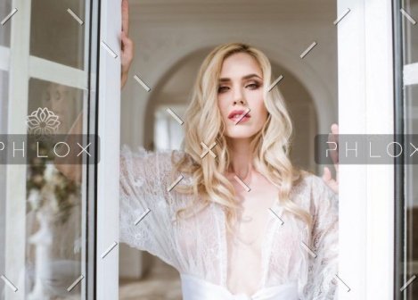 demo-attachment-1257-fashionable-female-portrait-of-cute-lady-in-white-PTEE8YH